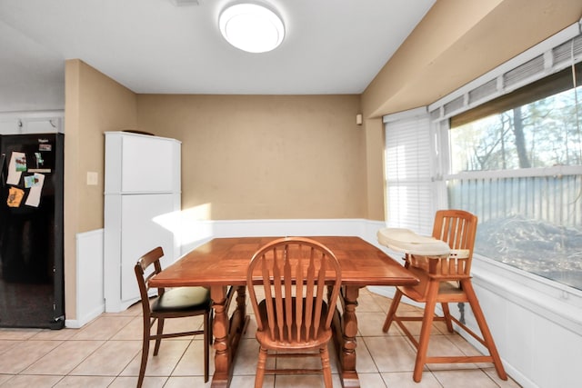 dining room featuring light tile patterned floors