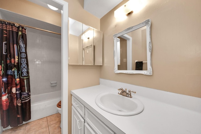 bathroom featuring shower / bath combo with shower curtain, toilet, vanity, and tile patterned flooring