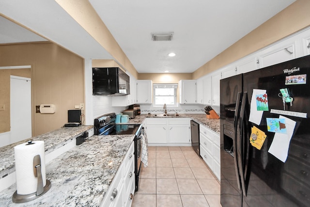 kitchen with visible vents, black appliances, a sink, white cabinetry, and light tile patterned floors