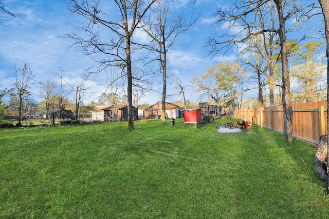 view of yard with fence