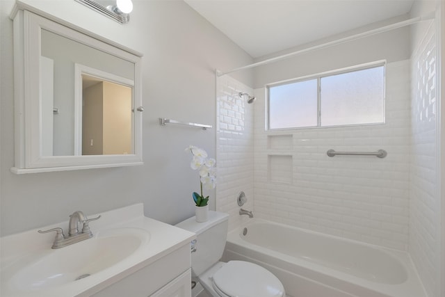 bathroom featuring shower / bath combination, toilet, and vanity