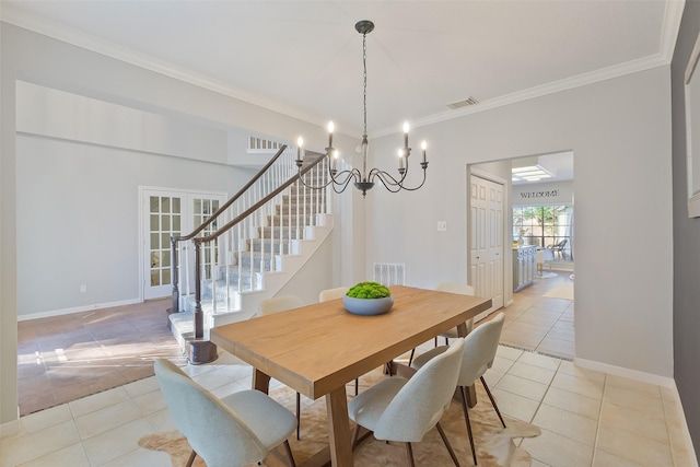 dining area featuring stairway, light tile patterned floors, and visible vents