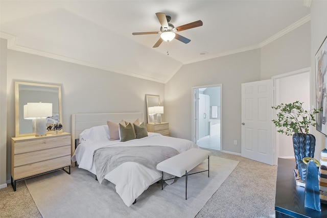 bedroom featuring baseboards, carpet floors, lofted ceiling, and crown molding