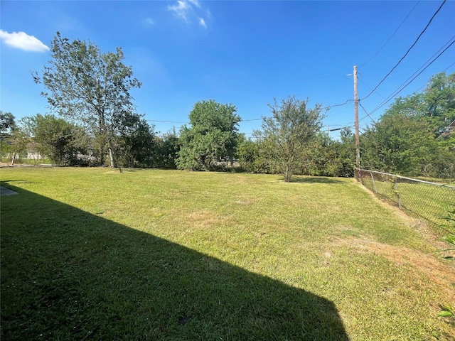 view of yard with fence