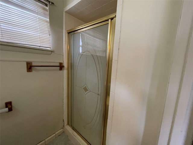 full bathroom featuring a stall shower