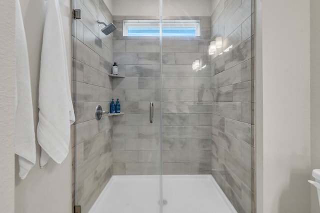 full bathroom with a stall shower