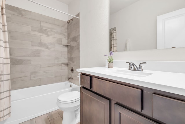 full bathroom with shower / bath combo with shower curtain, toilet, and vanity