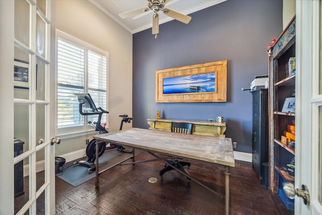 office space featuring ceiling fan, baseboards, and wood finished floors