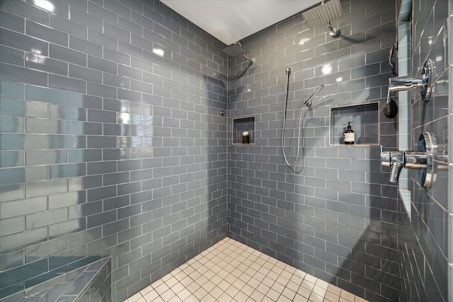 full bath featuring a tile shower