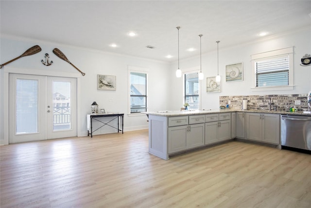 kitchen featuring gray cabinets, dishwasher, and crown molding