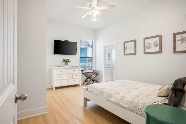 bedroom featuring light wood-style flooring, baseboards, and ceiling fan