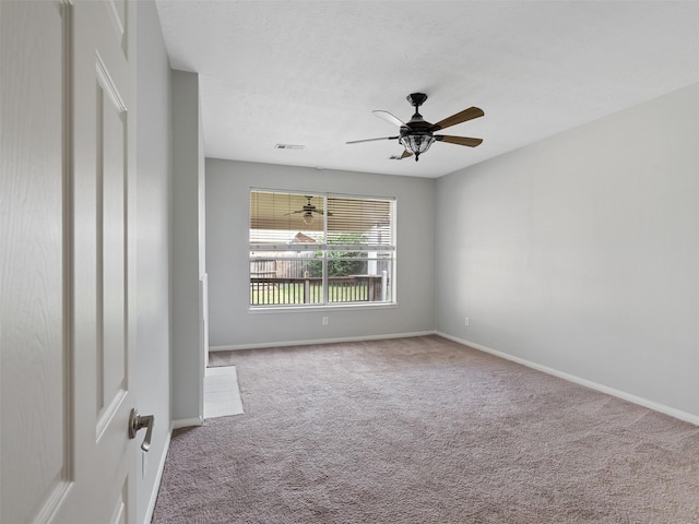 23134 Beech Canyon Dr, Katy, TX 77494 - carpeted spare room featuring baseboards and ceiling fan