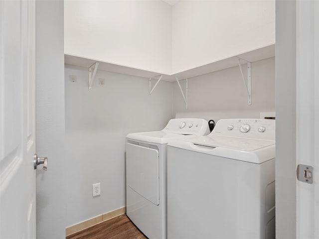 23134 Beech Canyon Dr, Katy, TX 77494 - clothes washing area featuring washing machine and dryer, dark wood-style floors, and baseboards