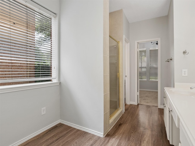23134 Beech Canyon Dr, Katy, TX 77494 - full bath featuring a stall shower, healthy amount of natural light, and wood finished floors