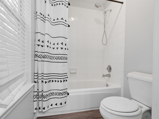 23134 Beech Canyon Dr, Katy, TX 77494 - full bathroom featuring toilet, shower / bathtub combination with curtain, and wood finished floors