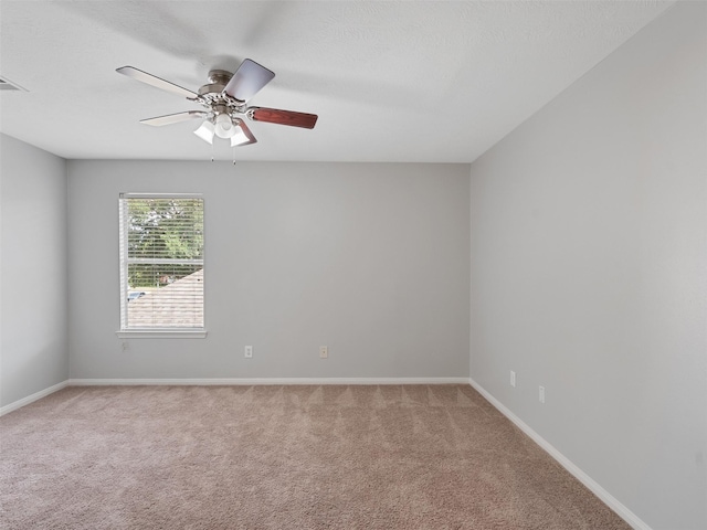 23134 Beech Canyon Dr, Katy, TX 77494 - unfurnished room with carpet, ceiling fan, and baseboards