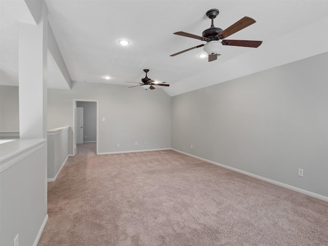23134 Beech Canyon Dr, Katy, TX 77494 - empty room with ceiling fan, light carpet, recessed lighting, baseboards, and lofted ceiling