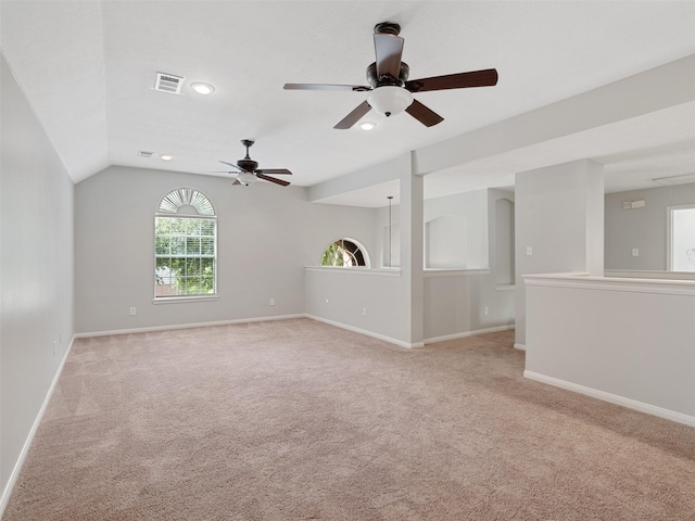 23134 Beech Canyon Dr, Katy, TX 77494 - unfurnished room with light carpet, a ceiling fan, baseboards, vaulted ceiling, and recessed lighting