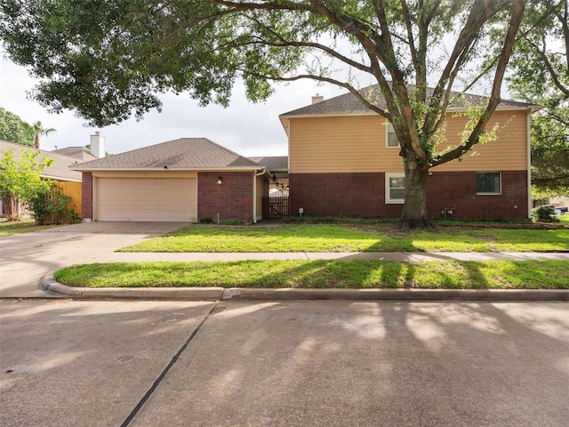 23134 Beech Canyon Dr, Katy, TX 77494 - view of property exterior featuring brick siding, driveway, and a garage