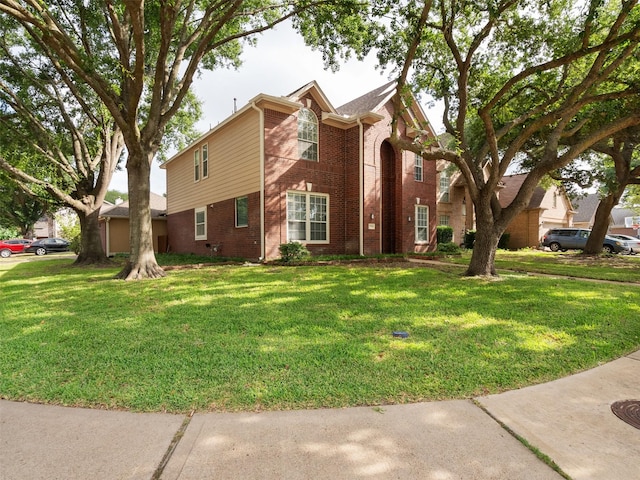 23134 Beech Canyon Dr, Katy, TX 77494 - view of property exterior featuring brick siding and a yard