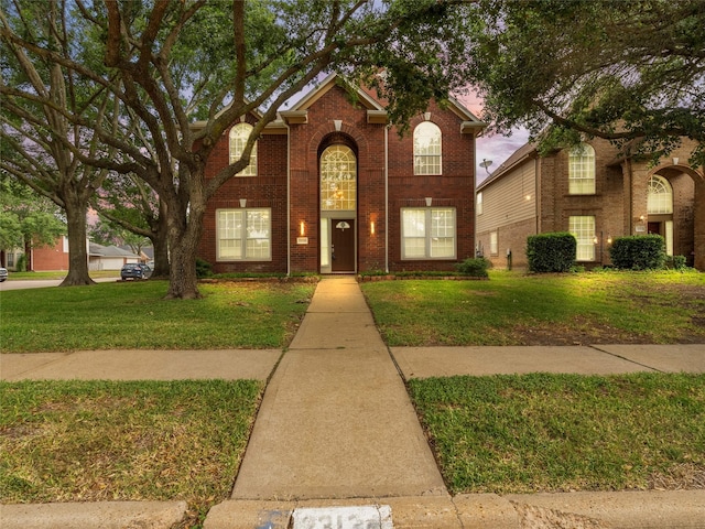 23134 Beech Canyon Dr, Katy, TX 77494 - traditional-style house with a front yard and brick siding