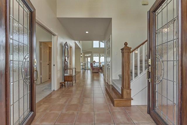 84 Waterford Way, Montgomery, TX 77356 - entryway with french doors, stairway, light tile patterned flooring, and recessed lighting