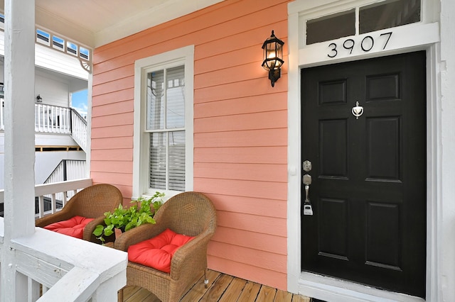 doorway to property featuring covered porch