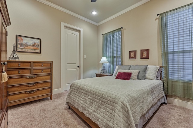 bedroom with crown molding, recessed lighting, light colored carpet, and baseboards