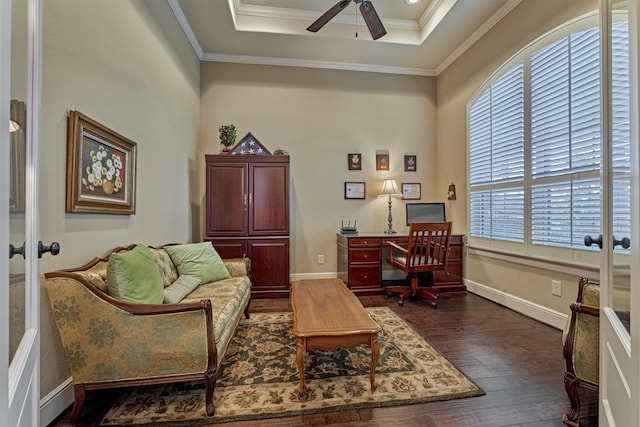 home office featuring dark wood finished floors, a tray ceiling, french doors, and ornamental molding