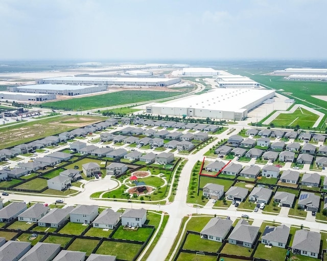 birds eye view of property with a residential view