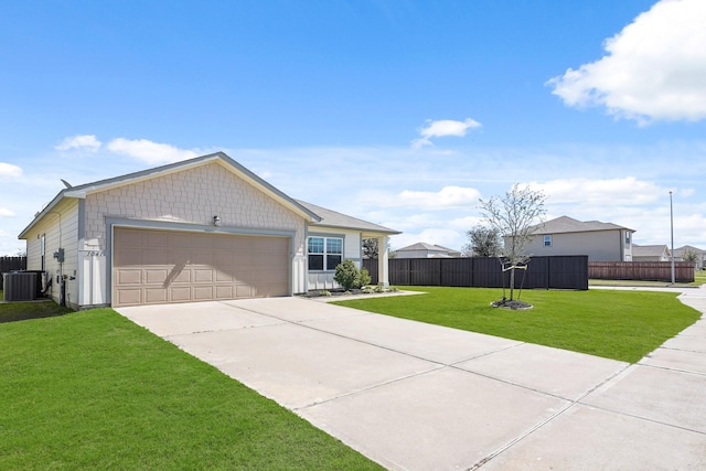 ranch-style house featuring central air condition unit, concrete driveway, a front yard, and fence