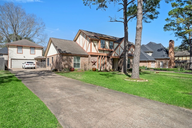 view of front of home with a front yard, a garage, brick siding, and a shingled roof