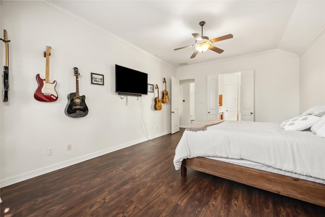 bedroom featuring crown molding, baseboards, dark wood-type flooring, lofted ceiling, and a ceiling fan