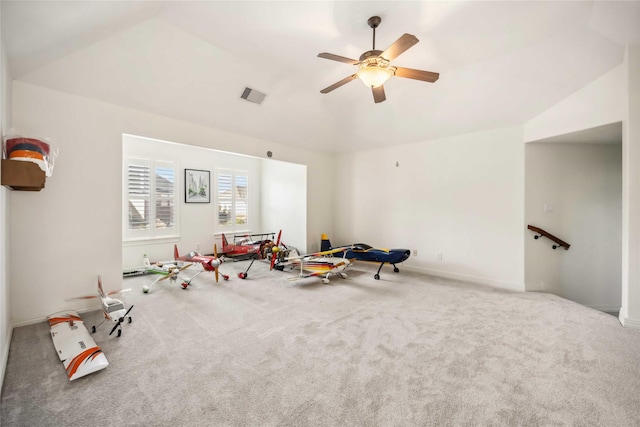 game room featuring lofted ceiling, carpet flooring, a ceiling fan, and visible vents