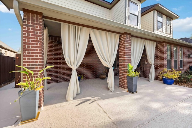 view of patio with fence