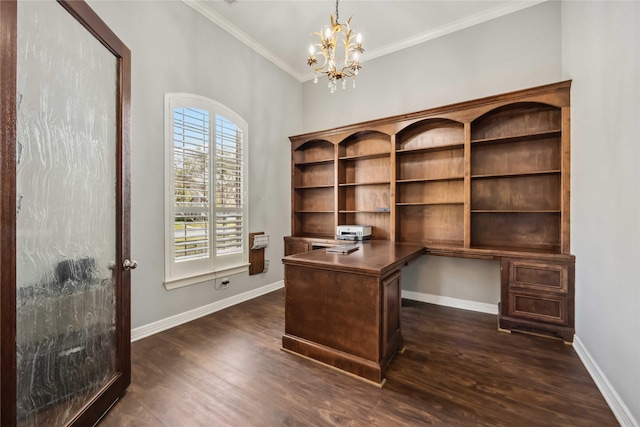 home office with dark wood-style floors, baseboards, built in desk, and ornamental molding