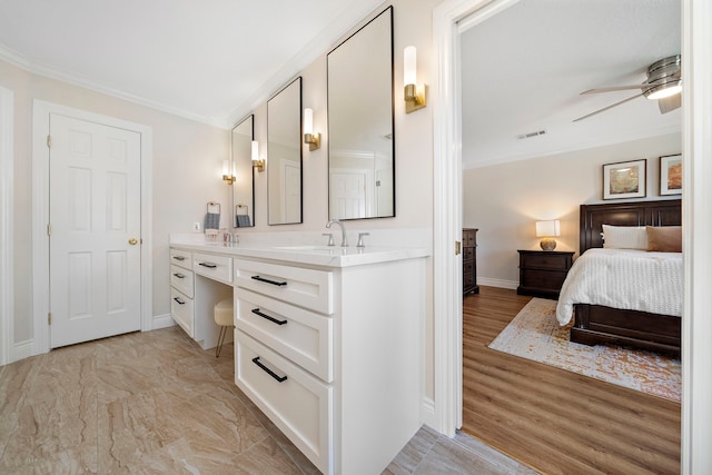 full bath with visible vents, ensuite bathroom, vanity, and crown molding