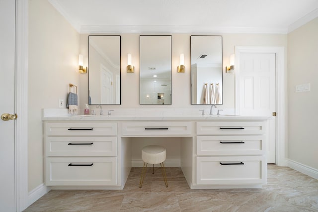 bathroom with double vanity, ornamental molding, and a sink