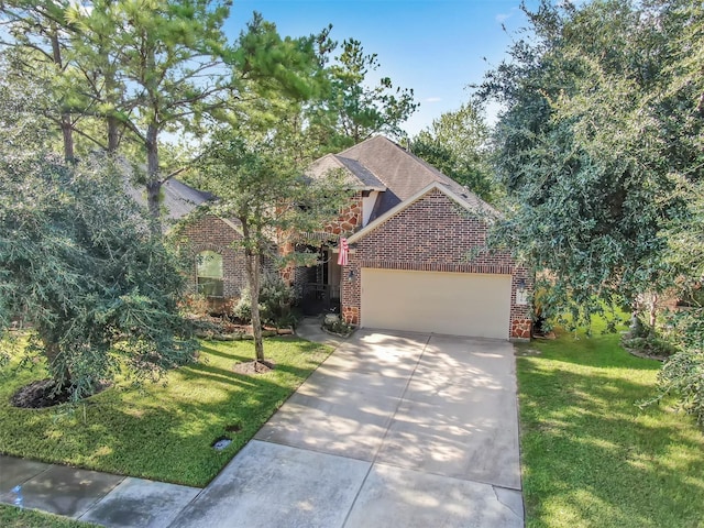 view of property hidden behind natural elements with a front lawn, roof with shingles, concrete driveway, an attached garage, and brick siding