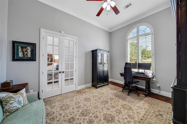 home office featuring crown molding, french doors, baseboards, and visible vents