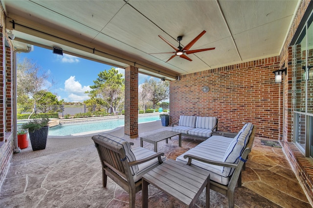 view of patio featuring an outdoor living space, a fenced in pool, ceiling fan, and fence