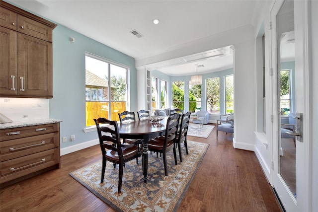 dining room featuring visible vents, recessed lighting, dark wood-type flooring, and baseboards