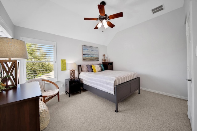 bedroom with visible vents, baseboards, carpet, vaulted ceiling, and a ceiling fan