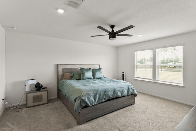 bedroom featuring a ceiling fan, baseboards, visible vents, recessed lighting, and carpet flooring