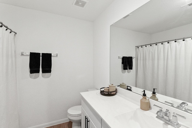 23515 Wrexham St, Spring, TX 77373 - bathroom with vanity, wood finished floors, and curtained shower