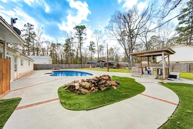 view of pool featuring a fenced in pool, a gazebo, a yard, a fenced backyard, and a patio