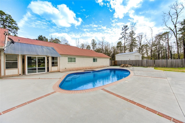 view of pool featuring a fenced backyard, a fenced in pool, and a patio