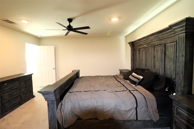 bedroom with recessed lighting, visible vents, light carpet, and a ceiling fan