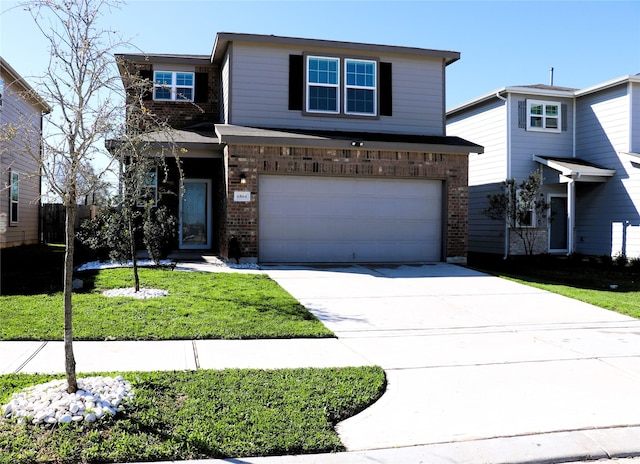 traditional-style home featuring brick siding, a garage, concrete driveway, and a front lawn