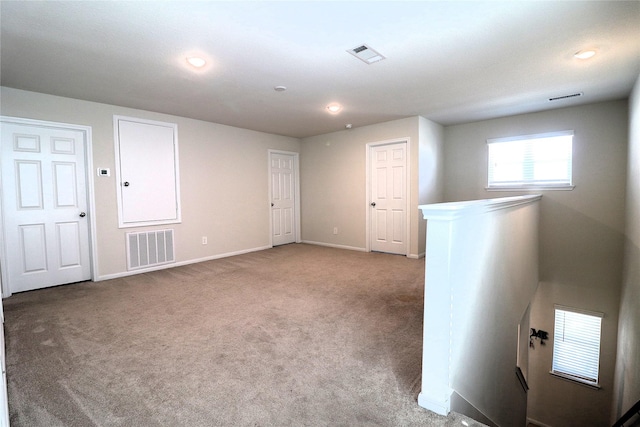 interior space featuring visible vents and baseboards